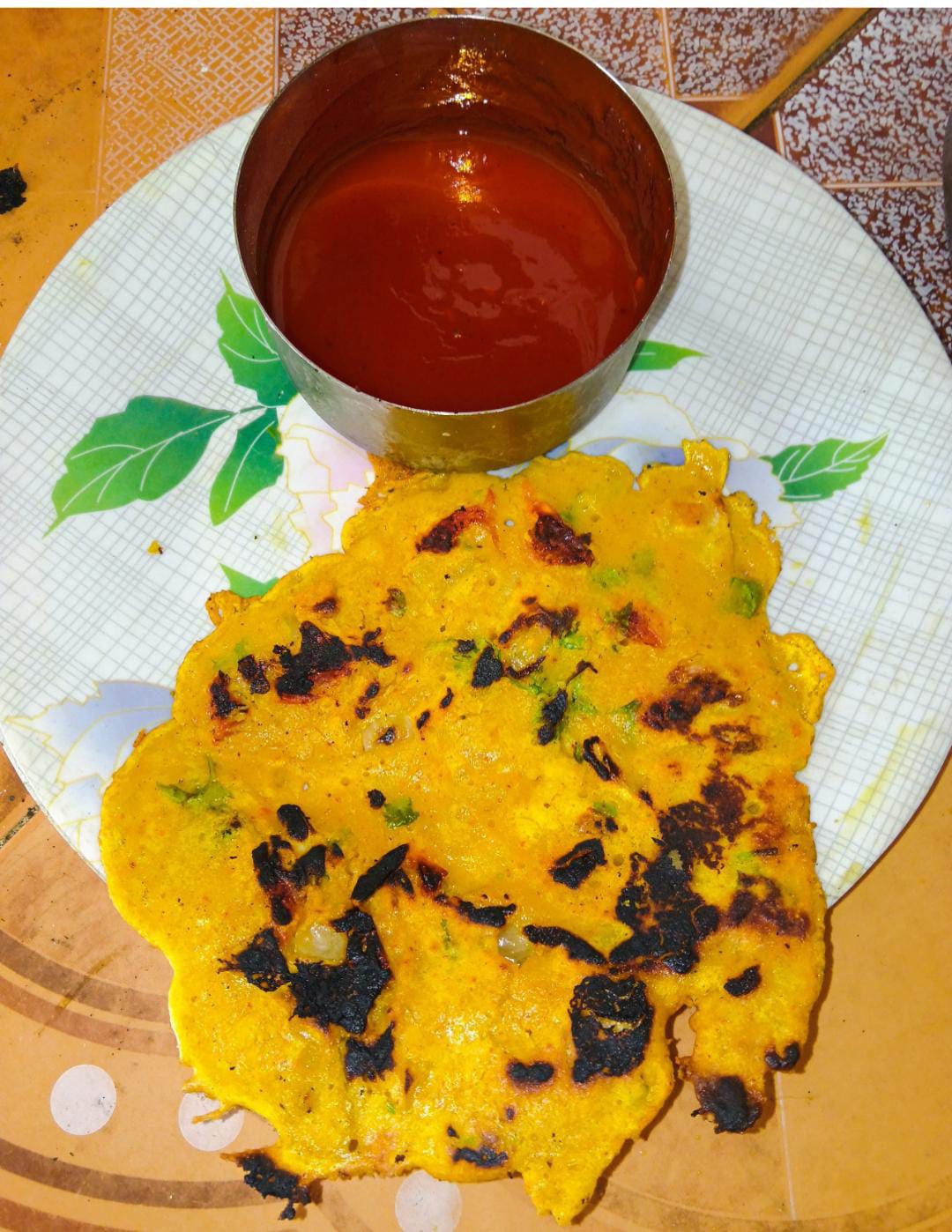 Student Guntab Singh holding the dish